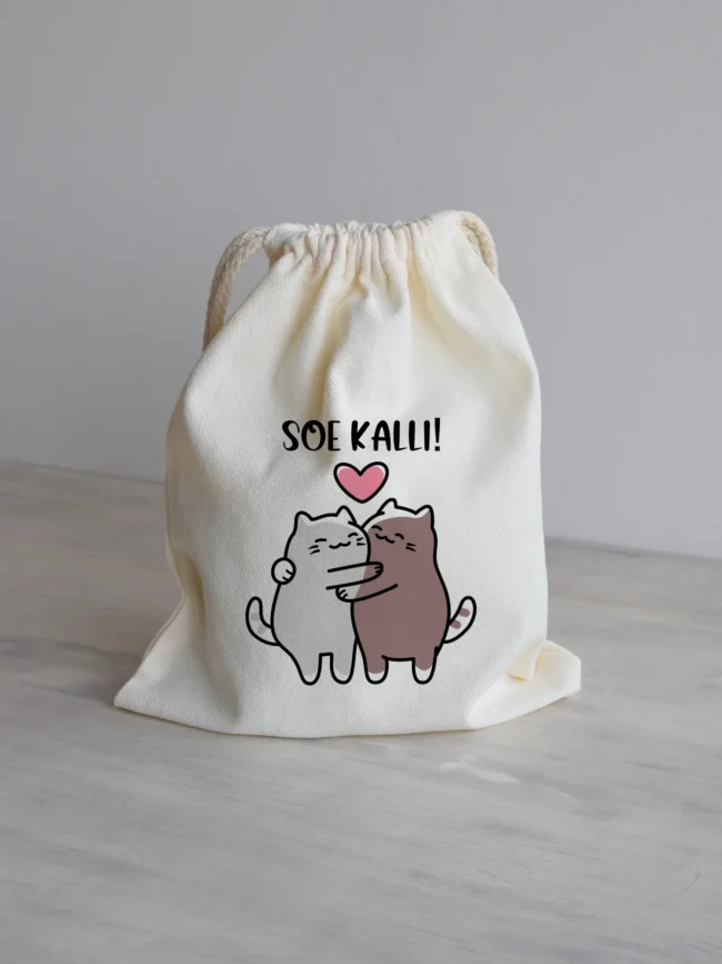 Riidest kinkekott Soe kalli kahe kallistava kassi pildiga.